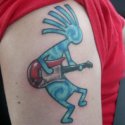 Kokobeli Cartoon Tattoo